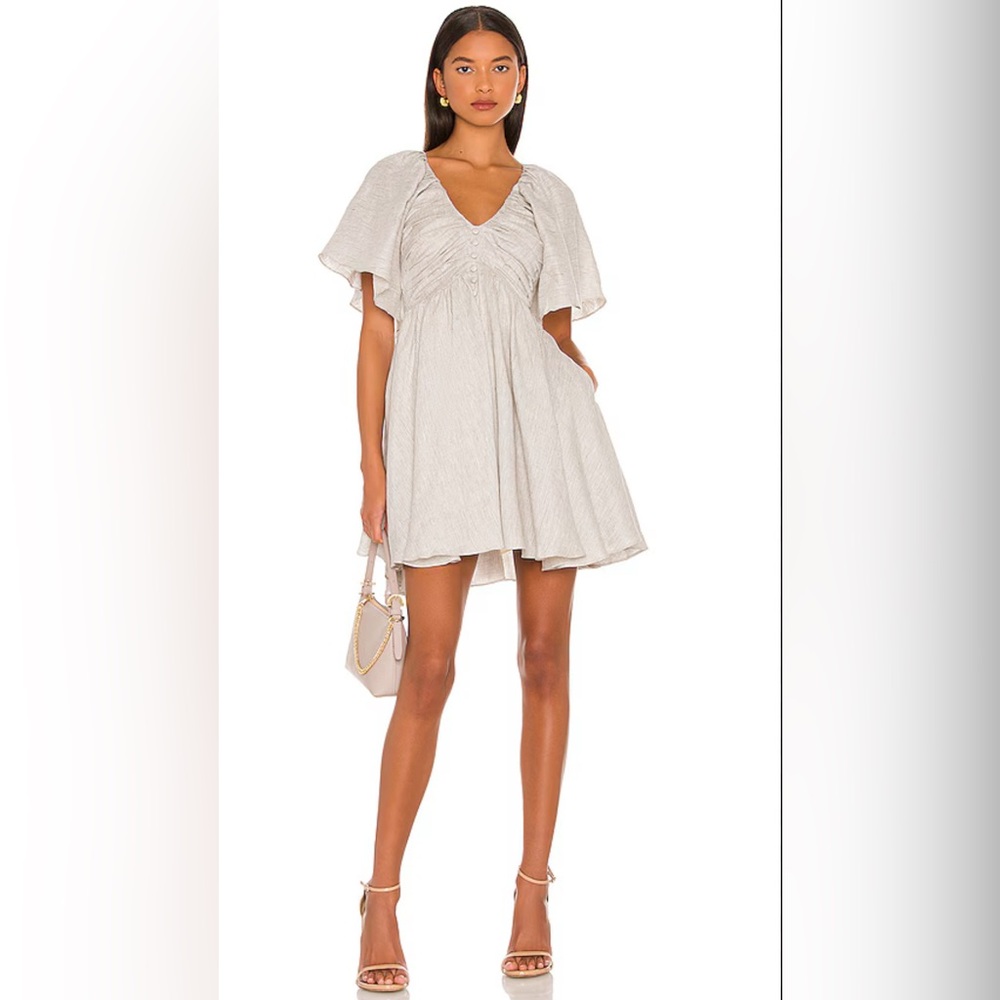 Cream linen mini dress, ideal for a summer wedding #weddingguest #minidress